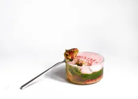 Strawberry ichigo pie in a cup — pink cream over matcha and crumbled pastry